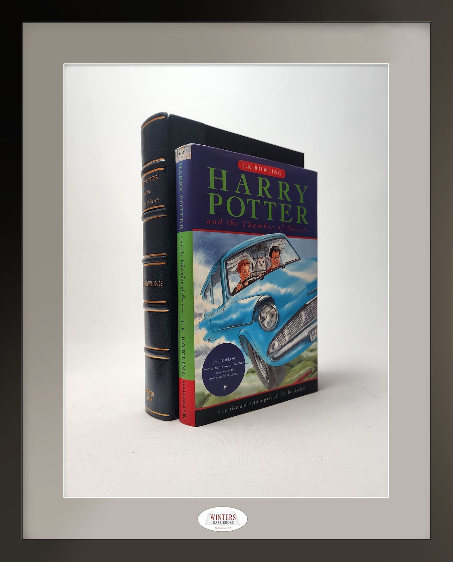 Harry Potter and the Philosopher’s Stone & Harry Potter and the Chamber of Secrets with Rare “Friend of Potter” Button – Signed with documentated provenance