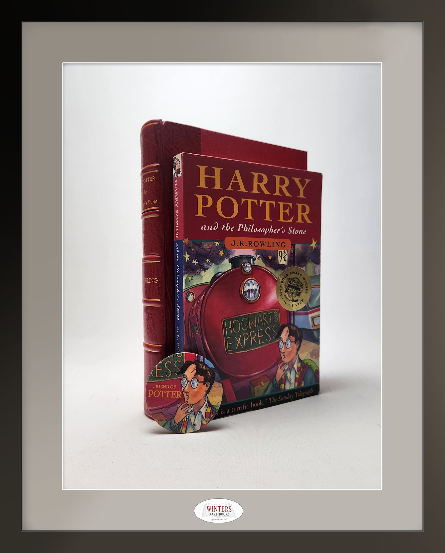 Harry Potter and the Philosopher’s Stone & Harry Potter and the Chamber of Secrets with Rare “Friend of Potter” Button – Signed with documentated provenance