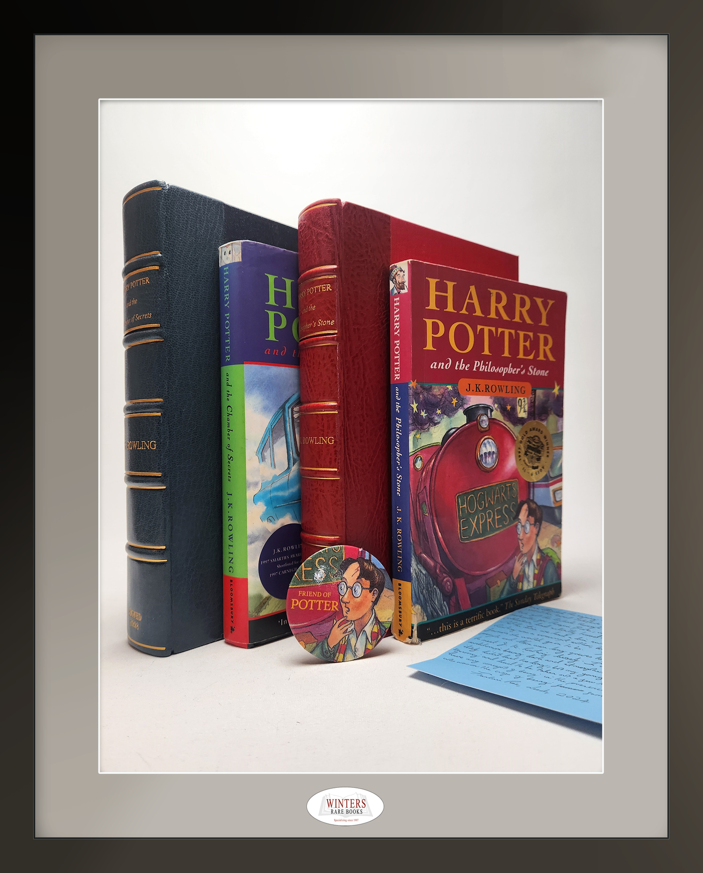 Harry Potter and the Philosopher’s Stone & Harry Potter and the Chamber of Secrets with Rare “Friend of Potter” Button – Signed with documentated provenance