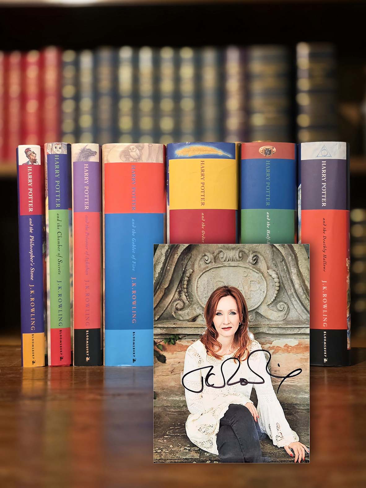 Full set Bloomsbury First editions Harry Potter with signed photo