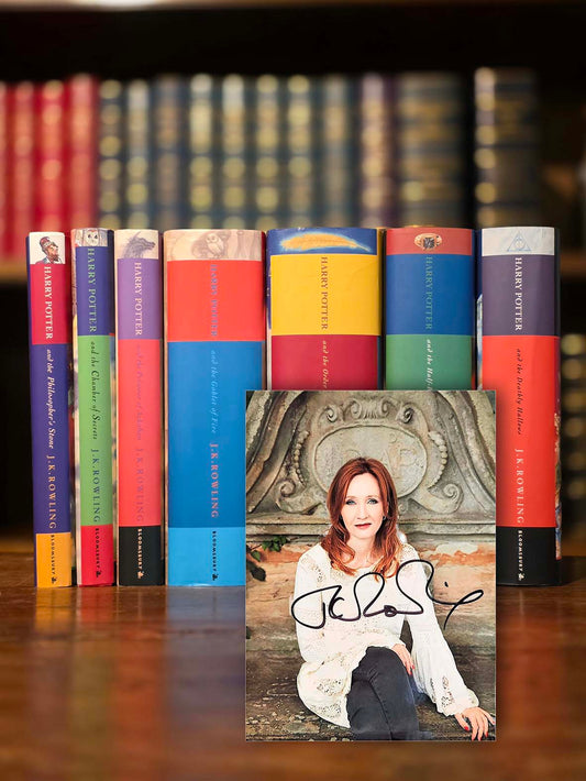 Full set Bloomsbury First editions Harry Potter with signed photo