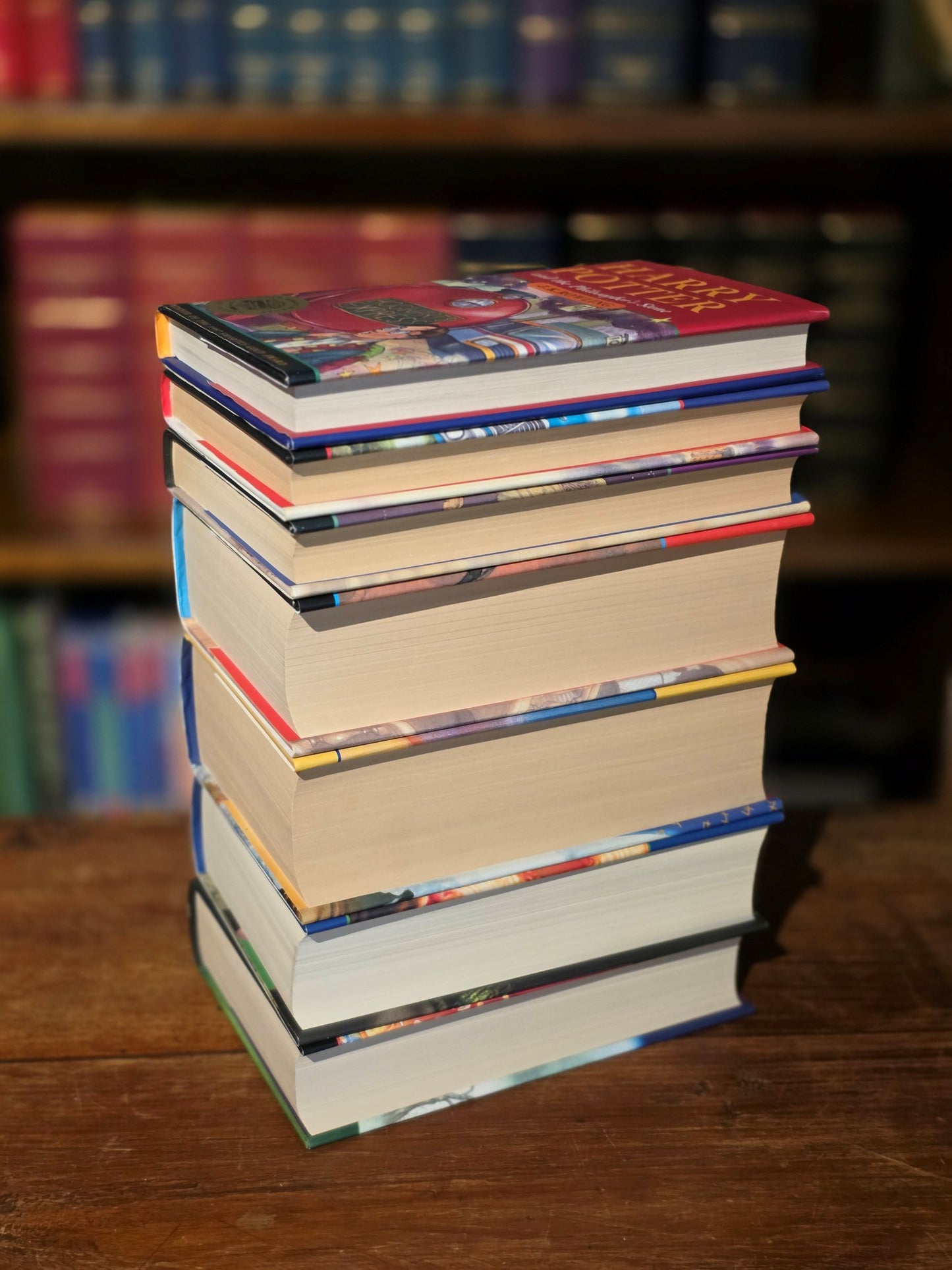 The Harry Potter series – Full set original Hardback first editions, first printings – Scarse 2020 signed J.K. Rowling photo included
