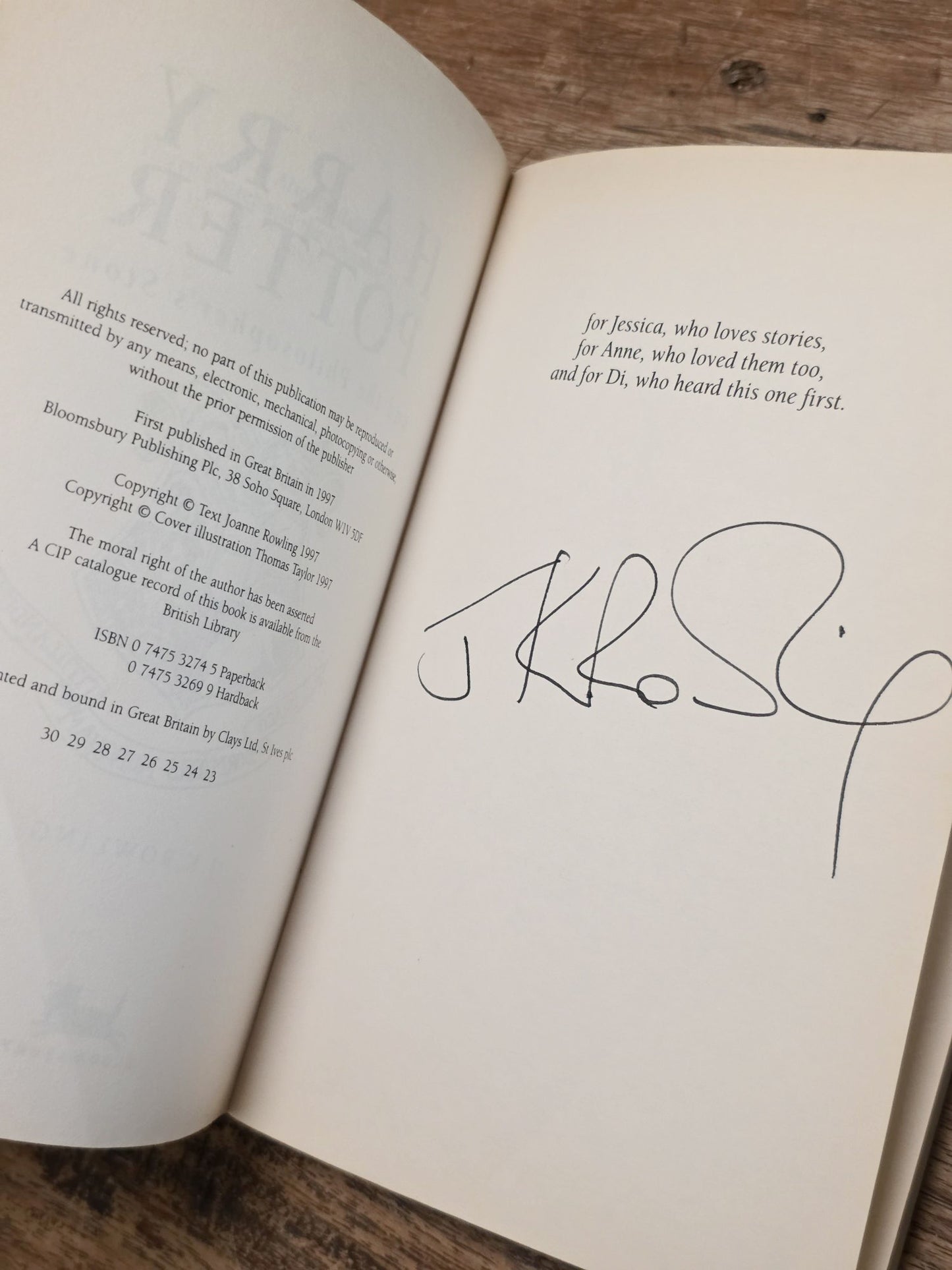 Harry Potter and the Philosopher's Stone - Signed 23rd printing with returned double '1 Wand' error